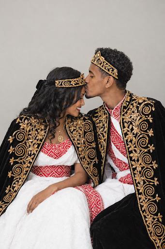 Regal couple enveloped in Ethiopian Kaba